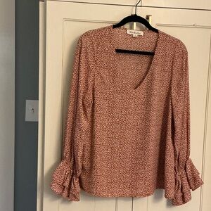 Ladies long sleeve rust/cream blouse. Size medium.